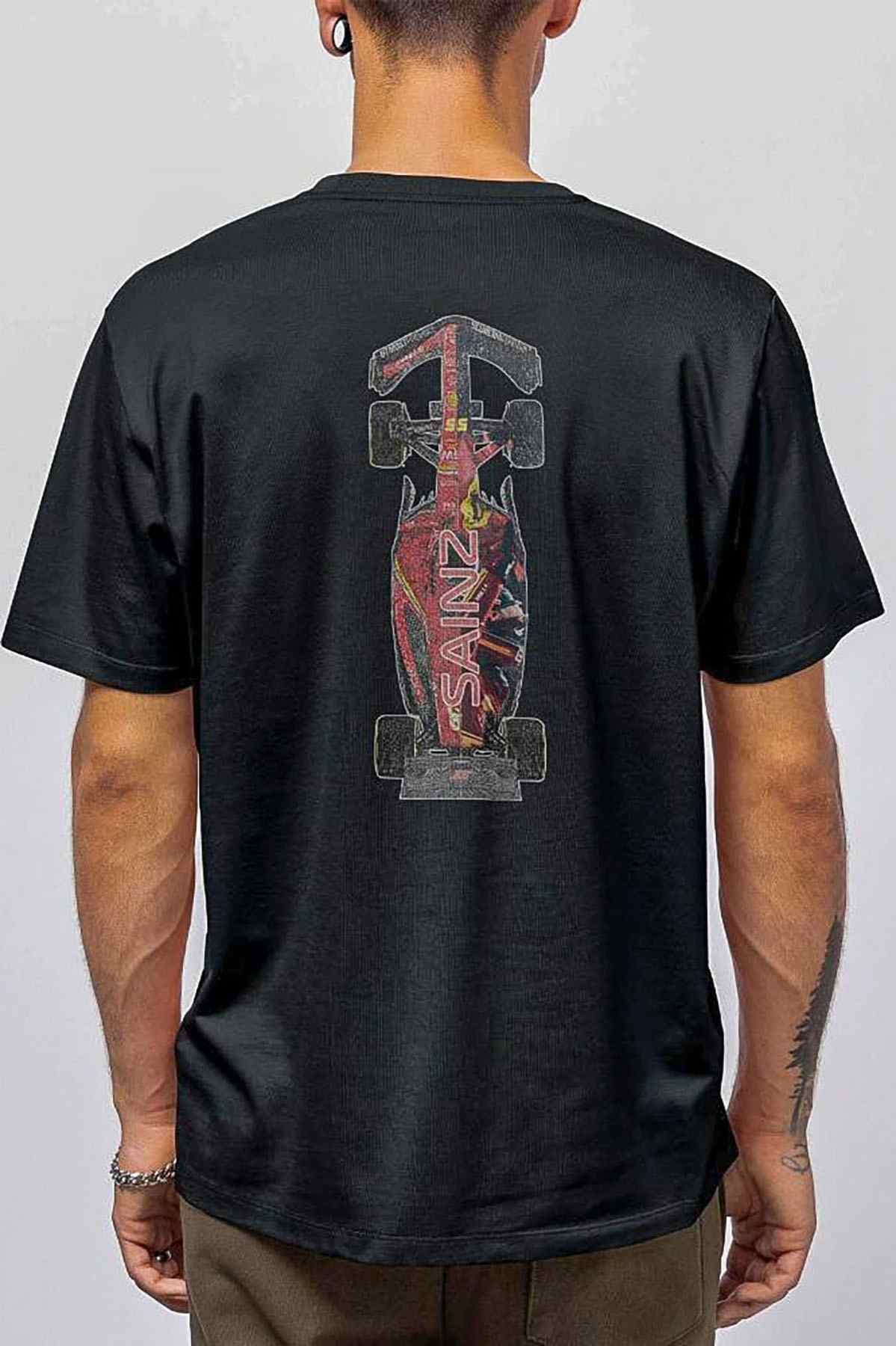 Model wearing Utmost Province Carlos Sainz Ferrari-inspired t-shirt, showcasing the graphic design on the back of the F1 shirt.