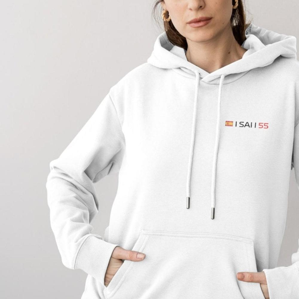 Model wearing a Carlos Sainz inspired F1 hoodie from Utmost Province's Ferrari F1 merch collection, highlighting the front left chest design of the hoodie.