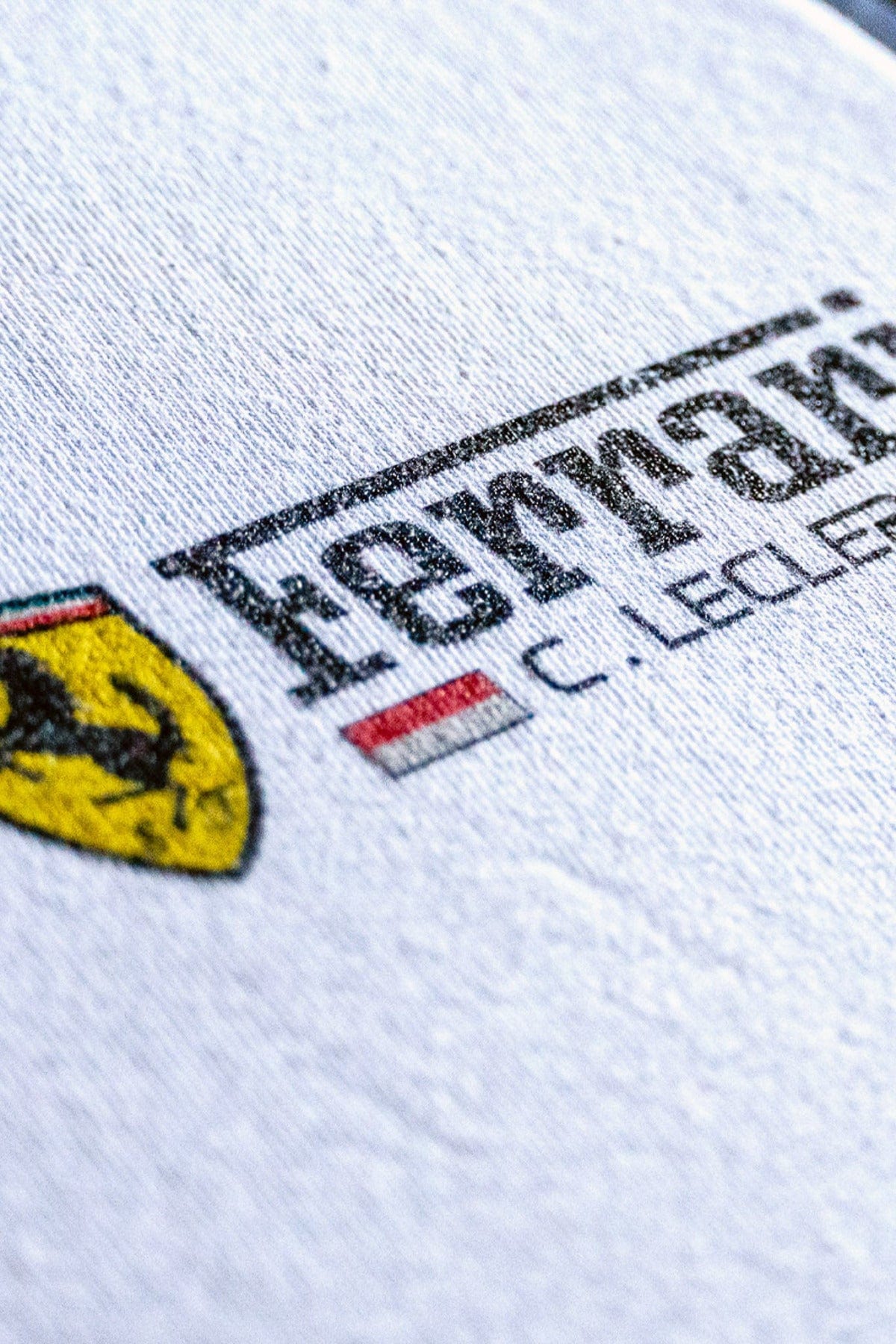 Close up of the front of Utmost Province custom Charles Leclerc shirt.