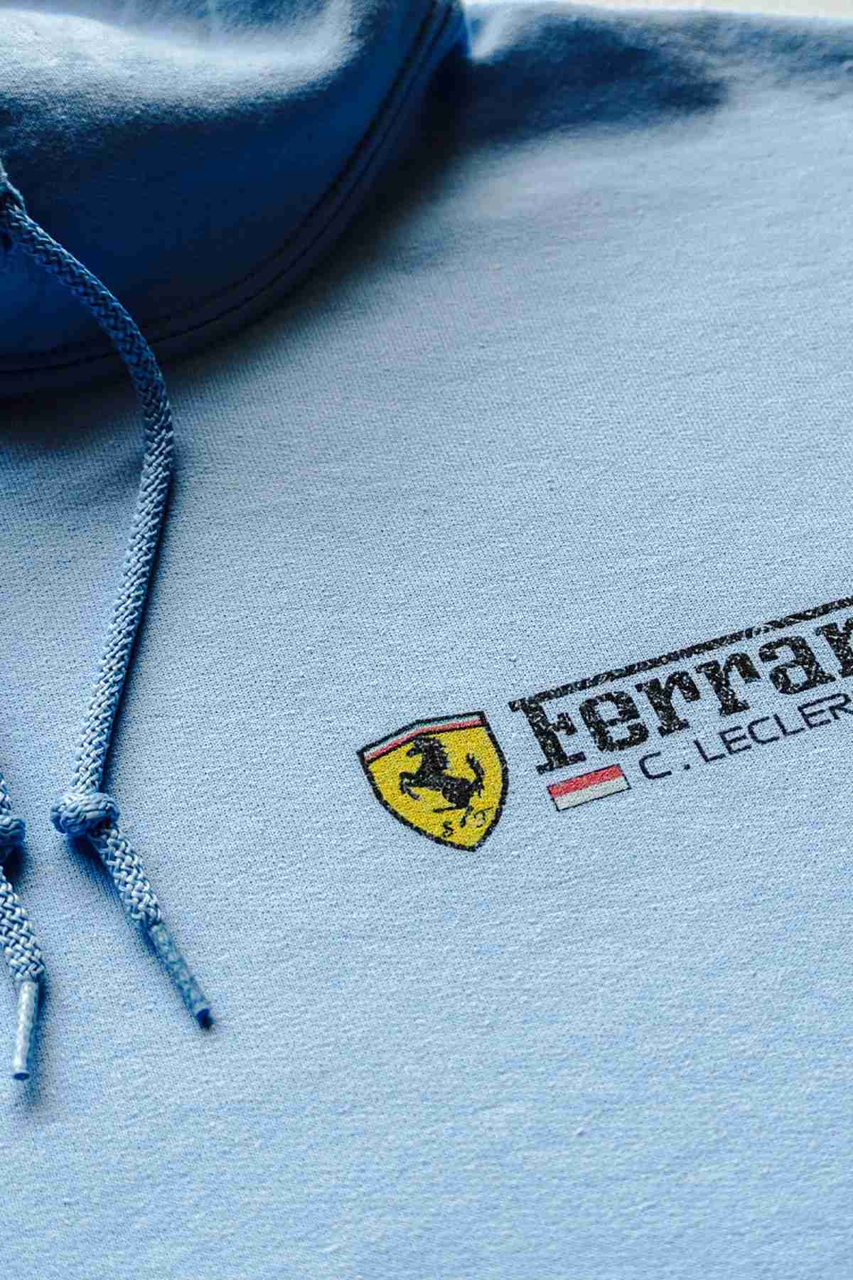 Close up of the front of a custom Ferrari F1 inspired hoodie, highlighting the details