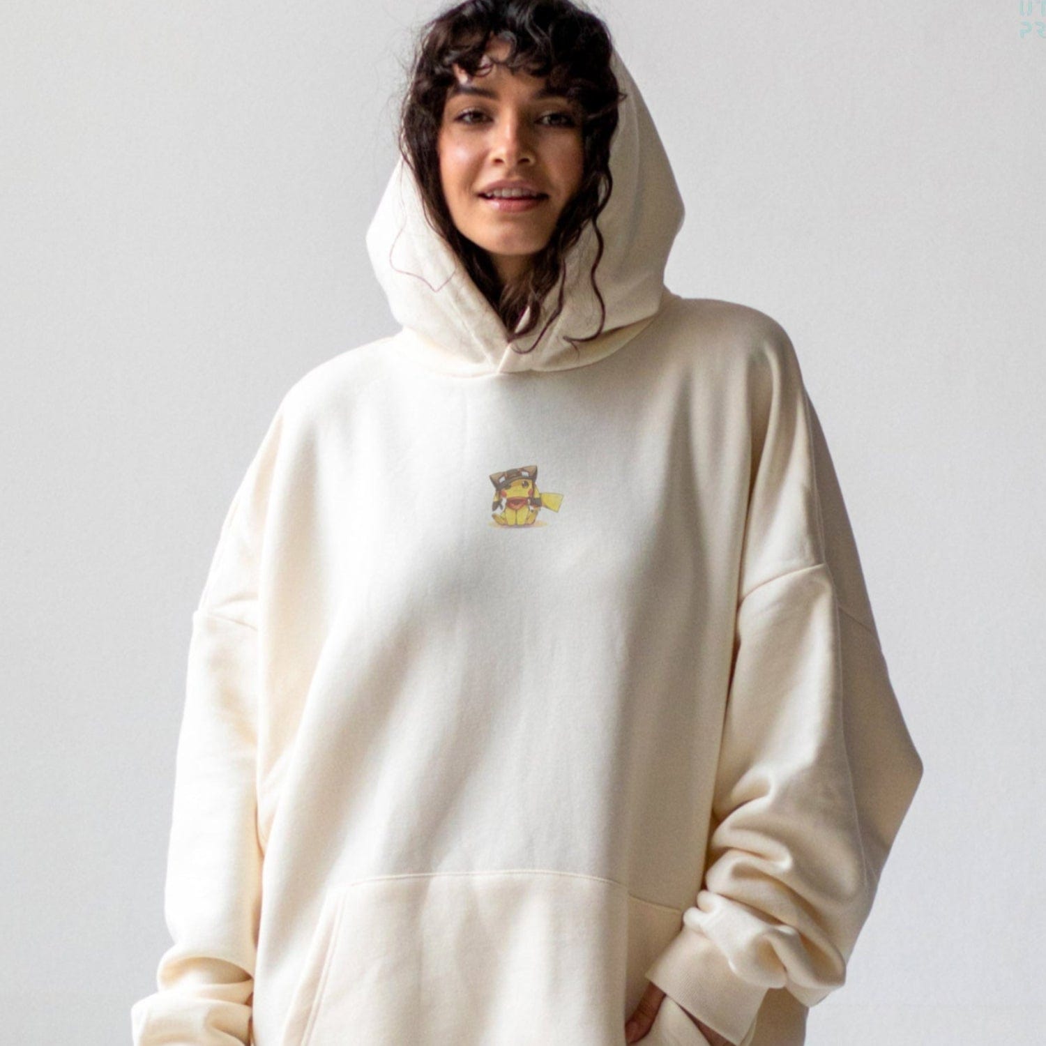 Shop custom hoodies and sweatshirts, featuring graphic designs inspired by F1 Racing, Pokemon, and One Piece anime.