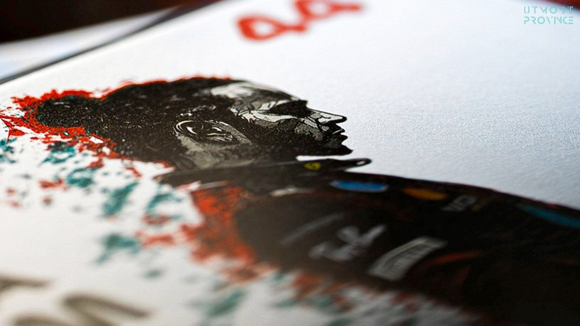 Close-up of a custom graphic design on a F1 shirt featuring Lewis Hamilton in Ferrari F1 gear, hand printed at Utmost Province.