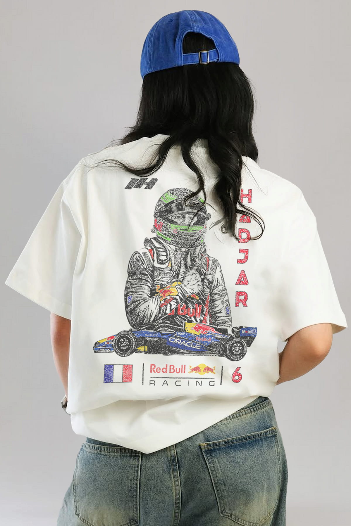 Model in a Isack Hadjar inspired Red Bull Racing shirt, showcasing the back design on a white cotton t-shirt.