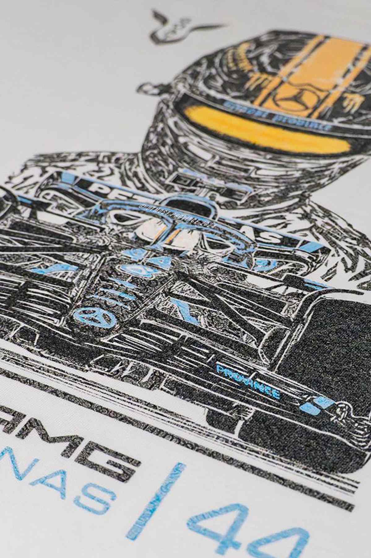 Utmost Province Lewis Hamilton Mercedes F1 shirt laid flat on a table, highlighting the graphic design on the back of the F1 shirt.
