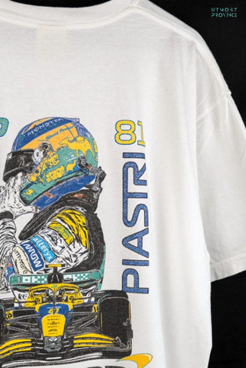 Mclaren F1 shirt inspired by Oscar Piastri on a hanger, highlighting the details of the design on the back of the custom Oscar Piastri merch.