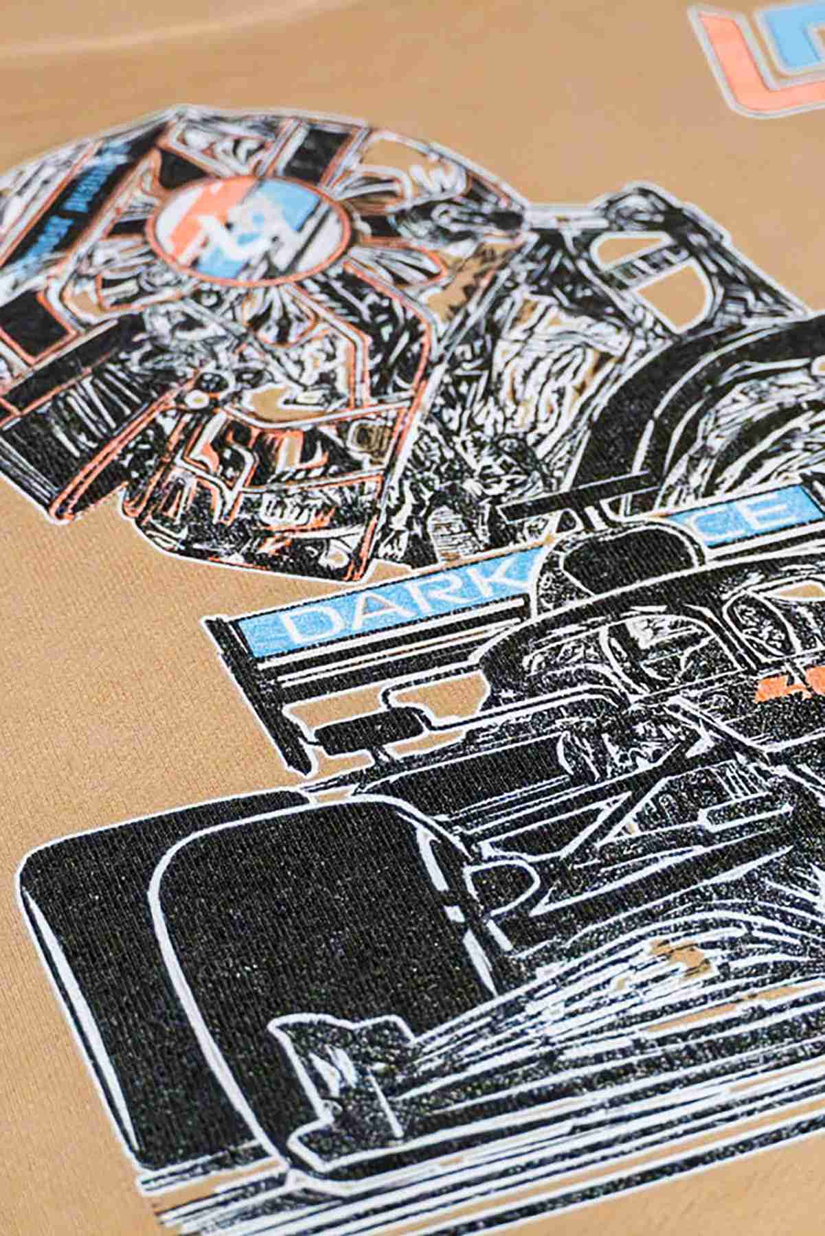 Utmost Province Mclaren F1 organic cotton hoodie laid flat on a table, highlighting the graphic design on the back of the unisex F1 hoodies.