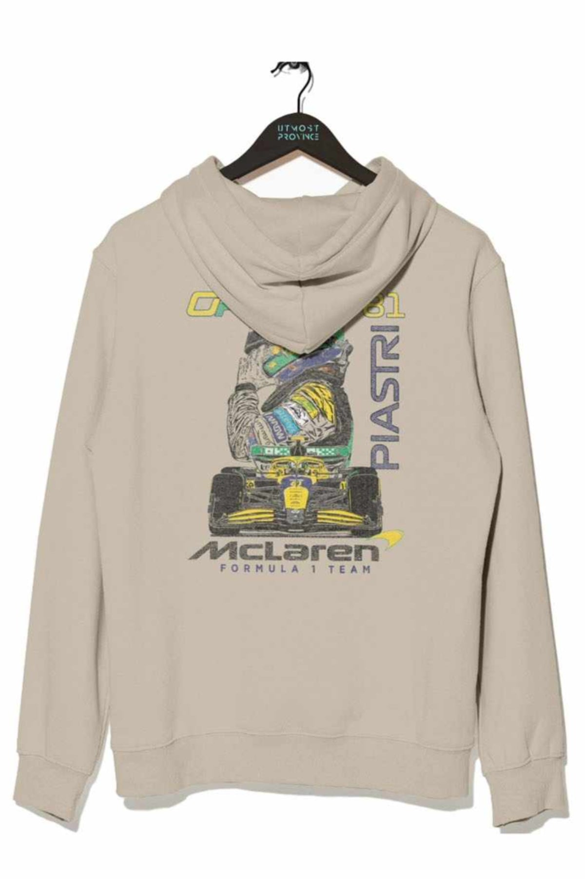Beige Mclaren hoodie on a hanger, showcasing the graphic design on the back.