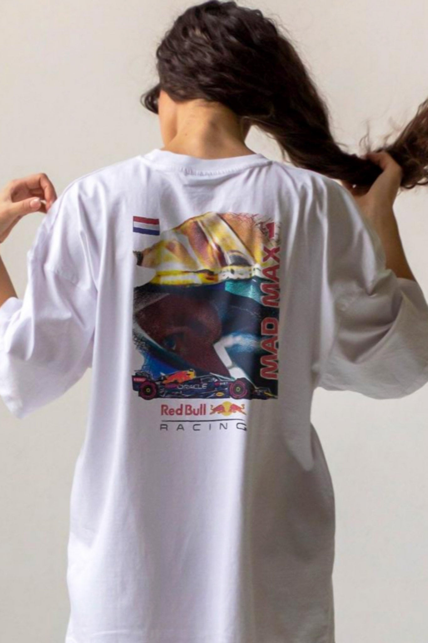 Short 3-4 second clip of Utmost Province exclusive Retro Red Bull F1 t-shirt, revealing the graphic design on the back.