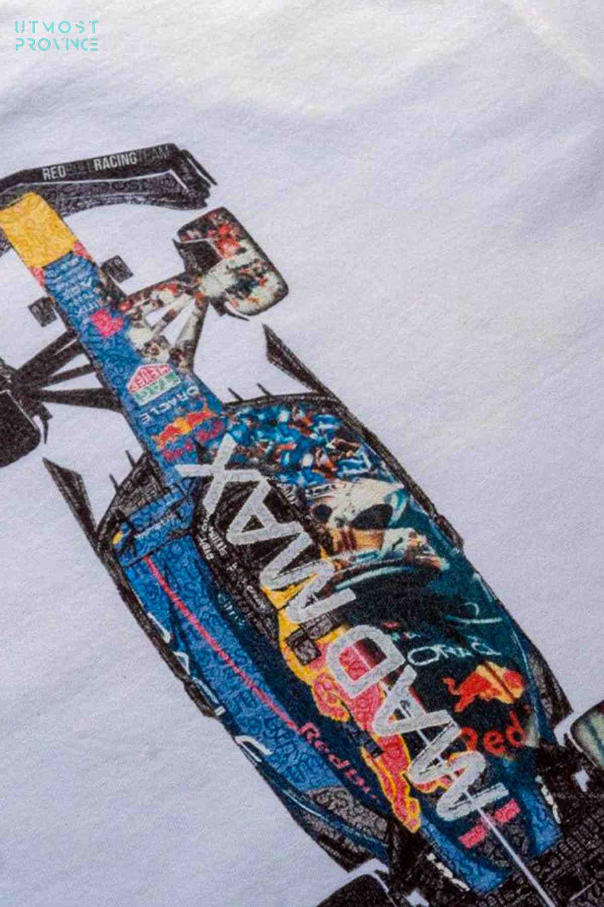 Custom Red Bull F1 shirt laid flat on a table, highlighting the design on the back.