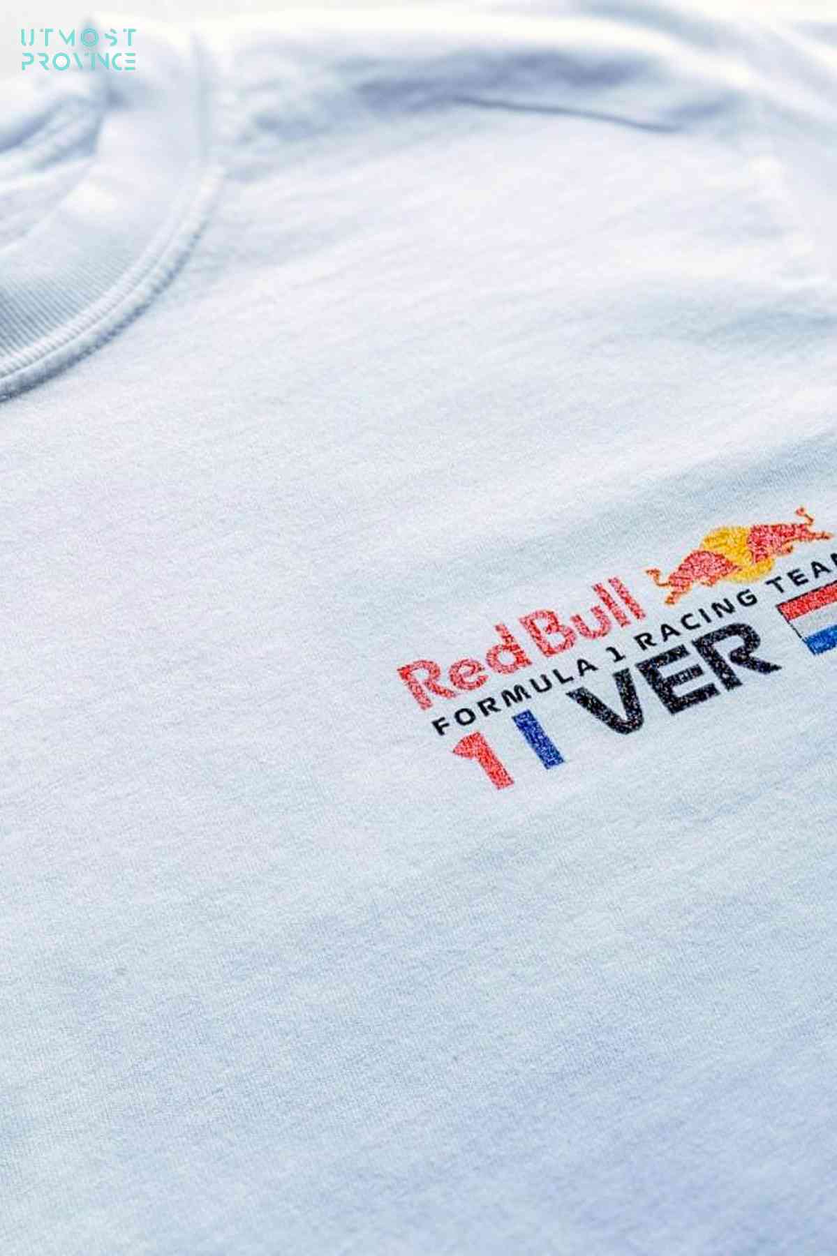 Utmost Province custom Red Bull Racing shirt laid flat on a table, highlighting the front design.