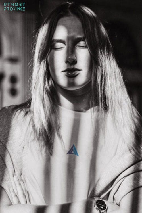 Model wearing a custom Williams Racing t-shirt, showcasing Utmost Province's F1 Retro T Shirts collection.