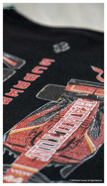 Lewis Hamilton inspired Ferrari shirt laid flat on a table, highlighting Utmost Province's unique design.