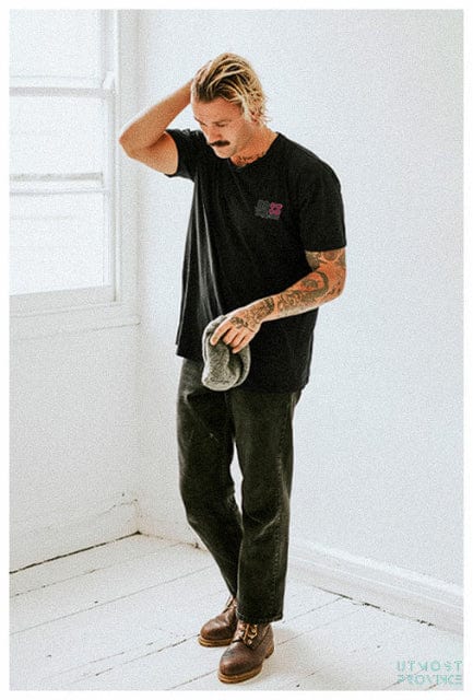 Model wearing a Yuki Tsunoda inspired t shirt, showcasing Utmost Province F1 shirts collection.