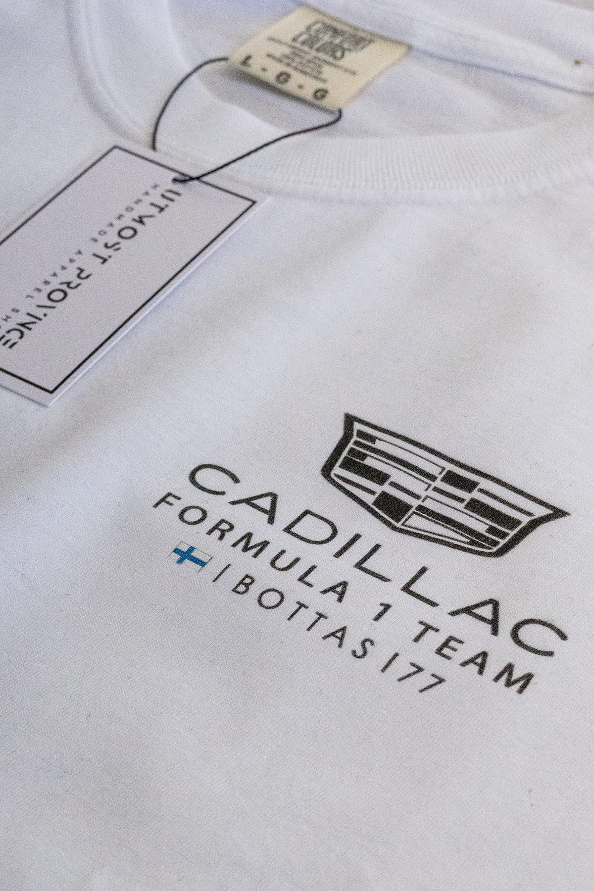 Close up front view of custom Cadillac t shirt inspired by Valtteri Bottas. Highlighting the graphic design on the front left chest.