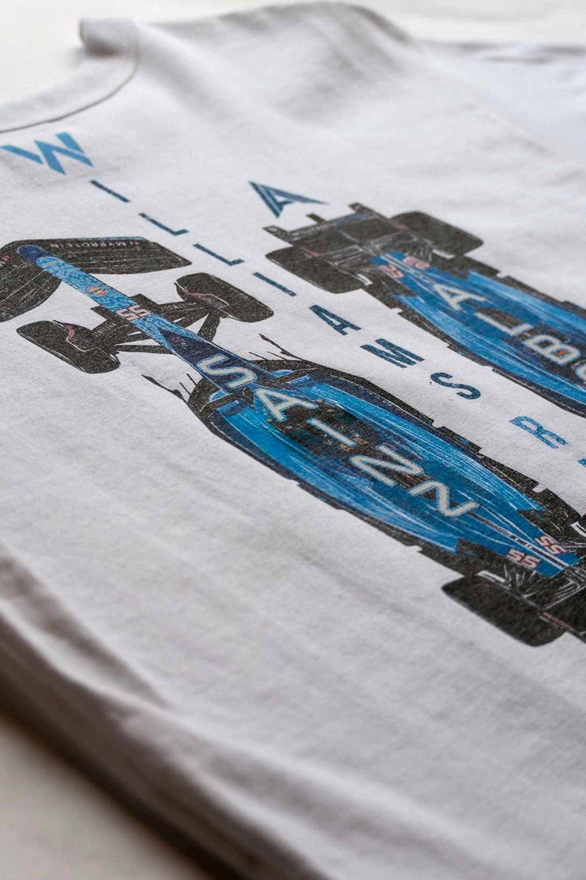 Close up of the back of Utmost Province custom Williams Racing cropped t shirt.