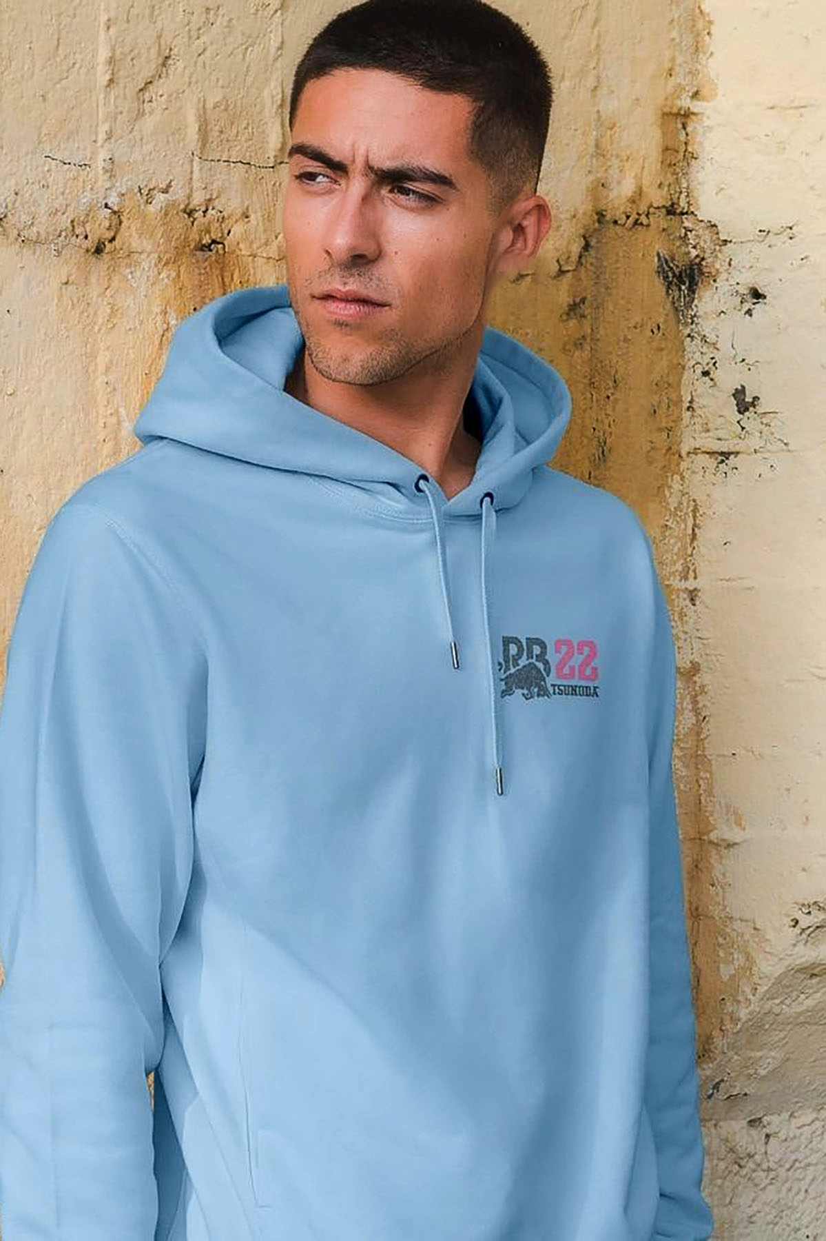 Model wearing Yuki Tsunoda custom F1 hoodie, showcasing the front graphic design on the Red Bull racing inspired merch.