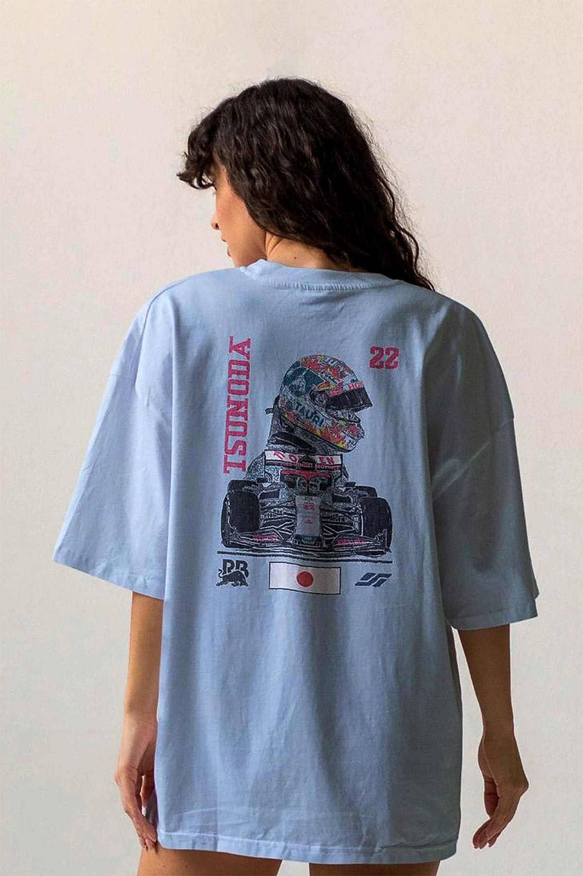 Model wearing Utmost Province Yuki Tsunoda F1 shirt, showcasing the exclusive custom Red Bull Racing graphic design on the back of the unisex t-shirt.