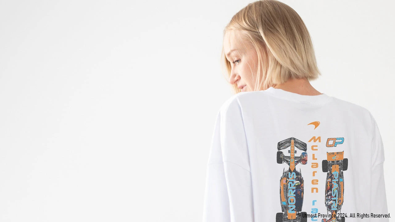 Desktop banner image of a model showcasing the Race Car Shirts Collection by Utmost Province, featuring premium handmade racing-inspired apparel for motorsport enthusiasts.