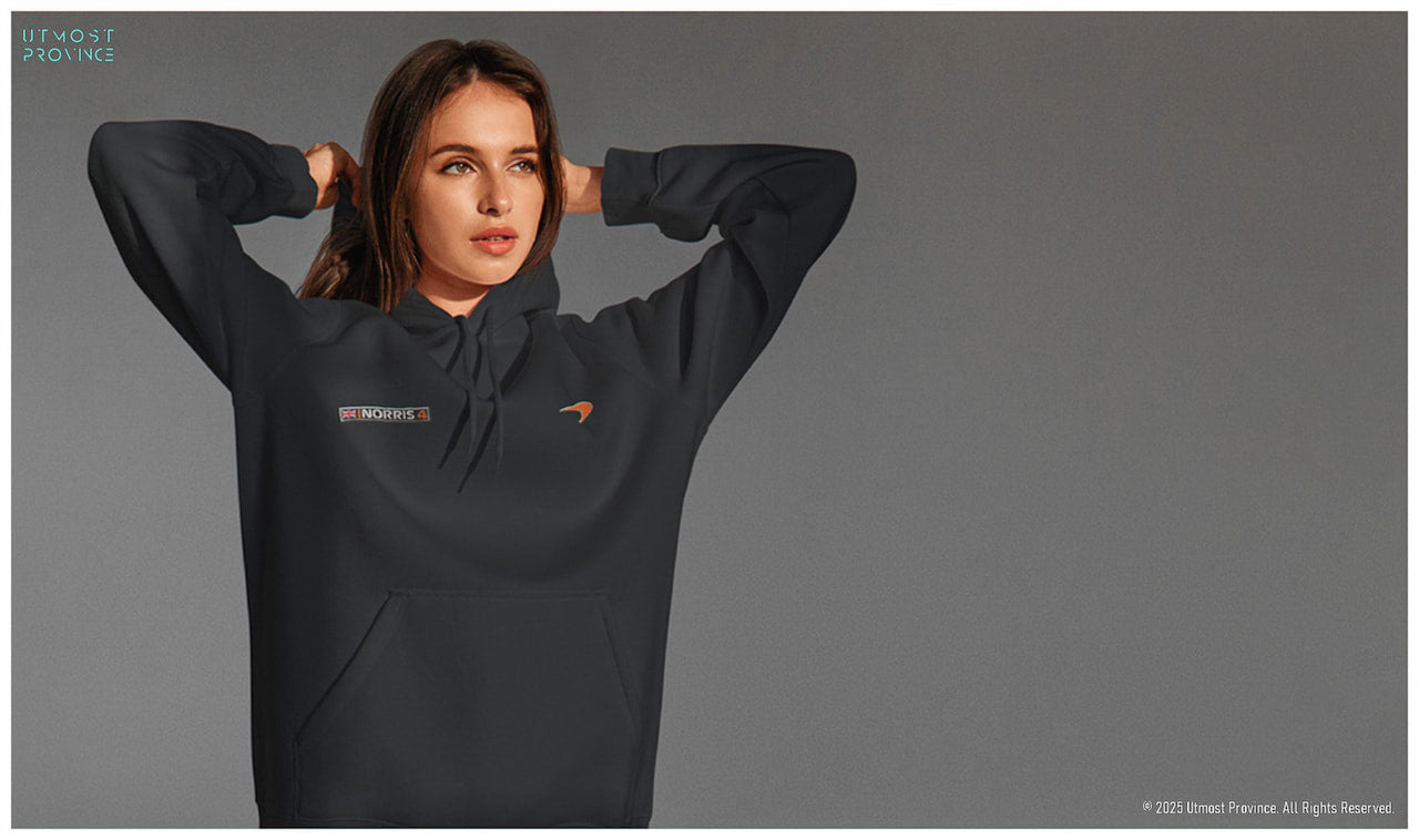 Model wearing a 100% organic cotton hoodie, showcasing Utmost Province's luxury hoodies collection, inspired by Formula 1 racing.