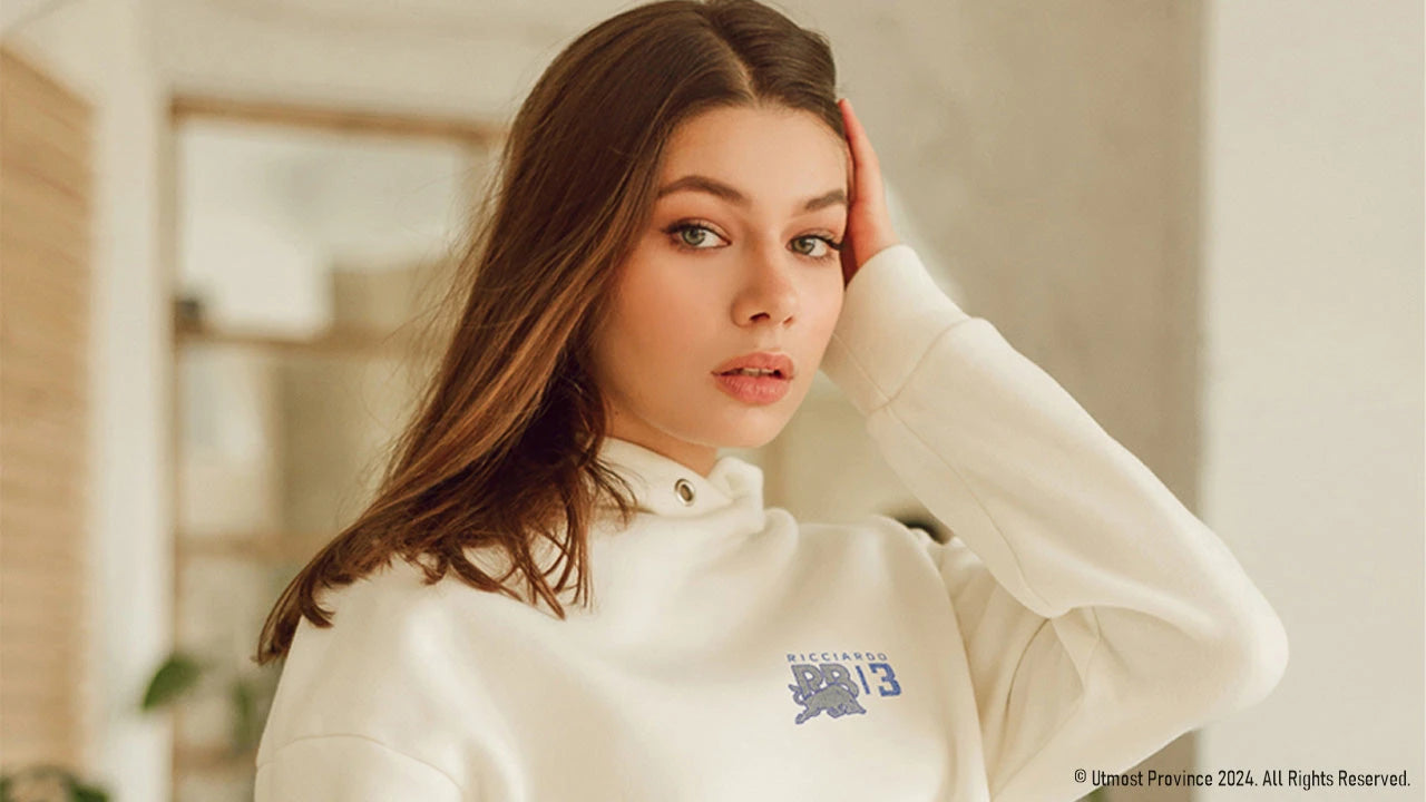 Banner image of a model wearing a custom Visa Cash App RB F1 hoodie from Utmost Province's Formula 1-inspired merch collection.