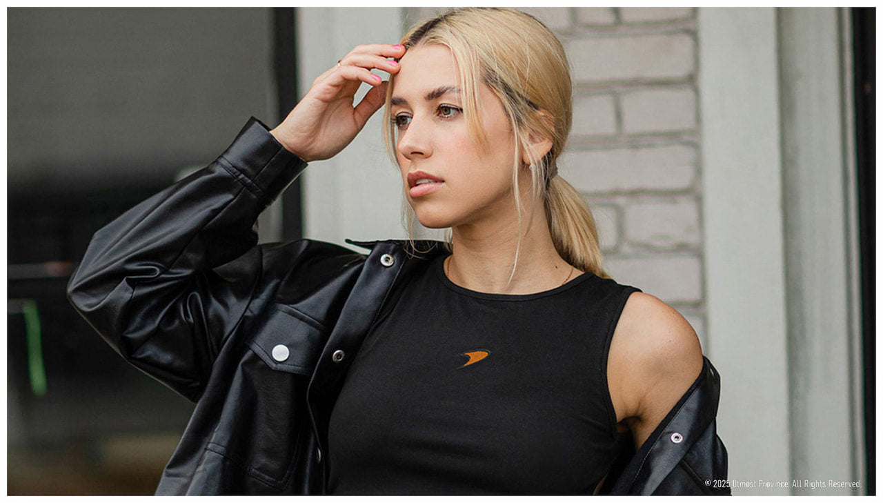 Model showcasing Utmost Province women's crop top collection.