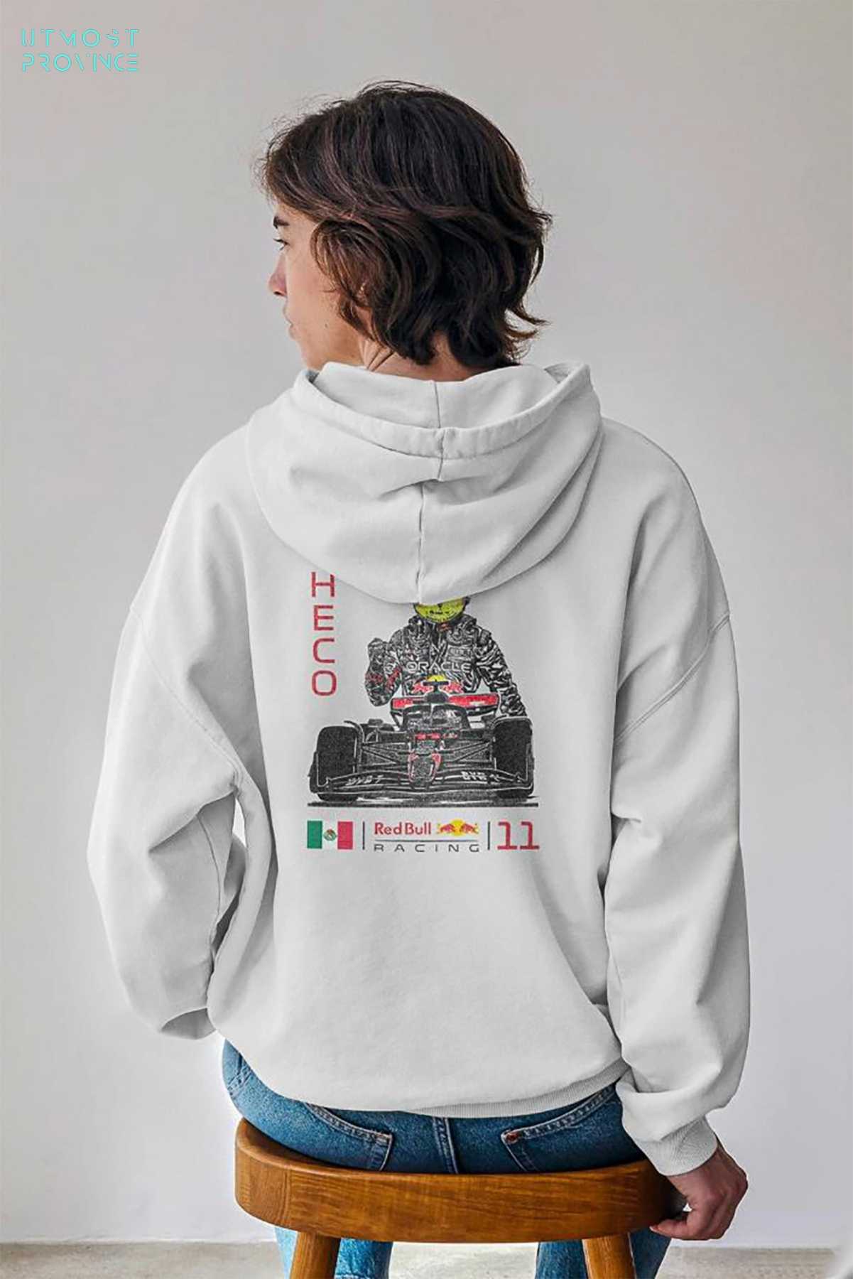 Model wearing Utmost Province Red Bull F1 hoodie inspired by Sergio Perez, showcasing the design on the back of the hooded sweatshirt.