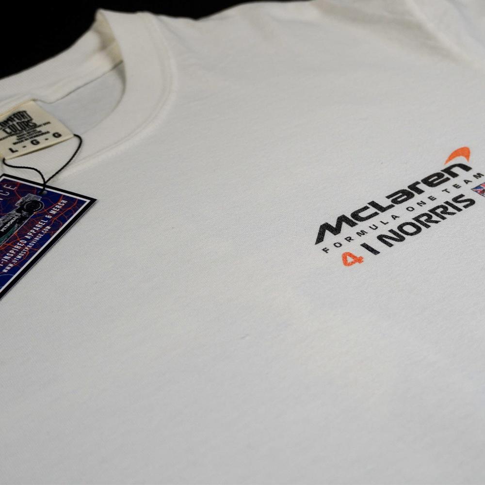 Close-up image of the front of a custom Mclaren F1 shirt, inspired by Lando Norris.