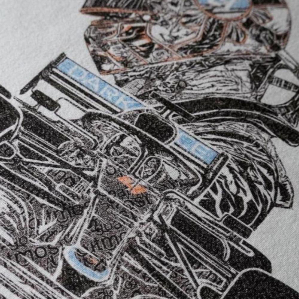 Detailed image of the unique text montage design on the back of Utmost Province's custom Lando Norris t-shirt.