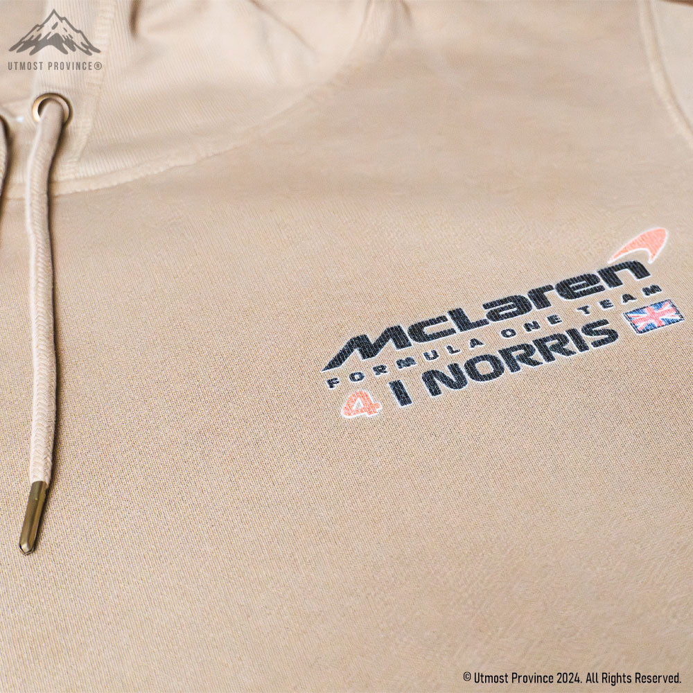 Detailed image of the front of Utmost Province's custom Lando Norris merch, showcasing the design on the front of the organic cotton hooded sweatshirt.