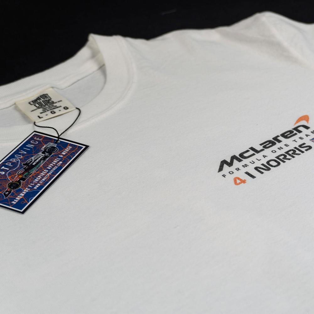 Front of a custom Mclaren racing shirt, showcasing the details of the unique Lando Norris-inspired graphic tee.