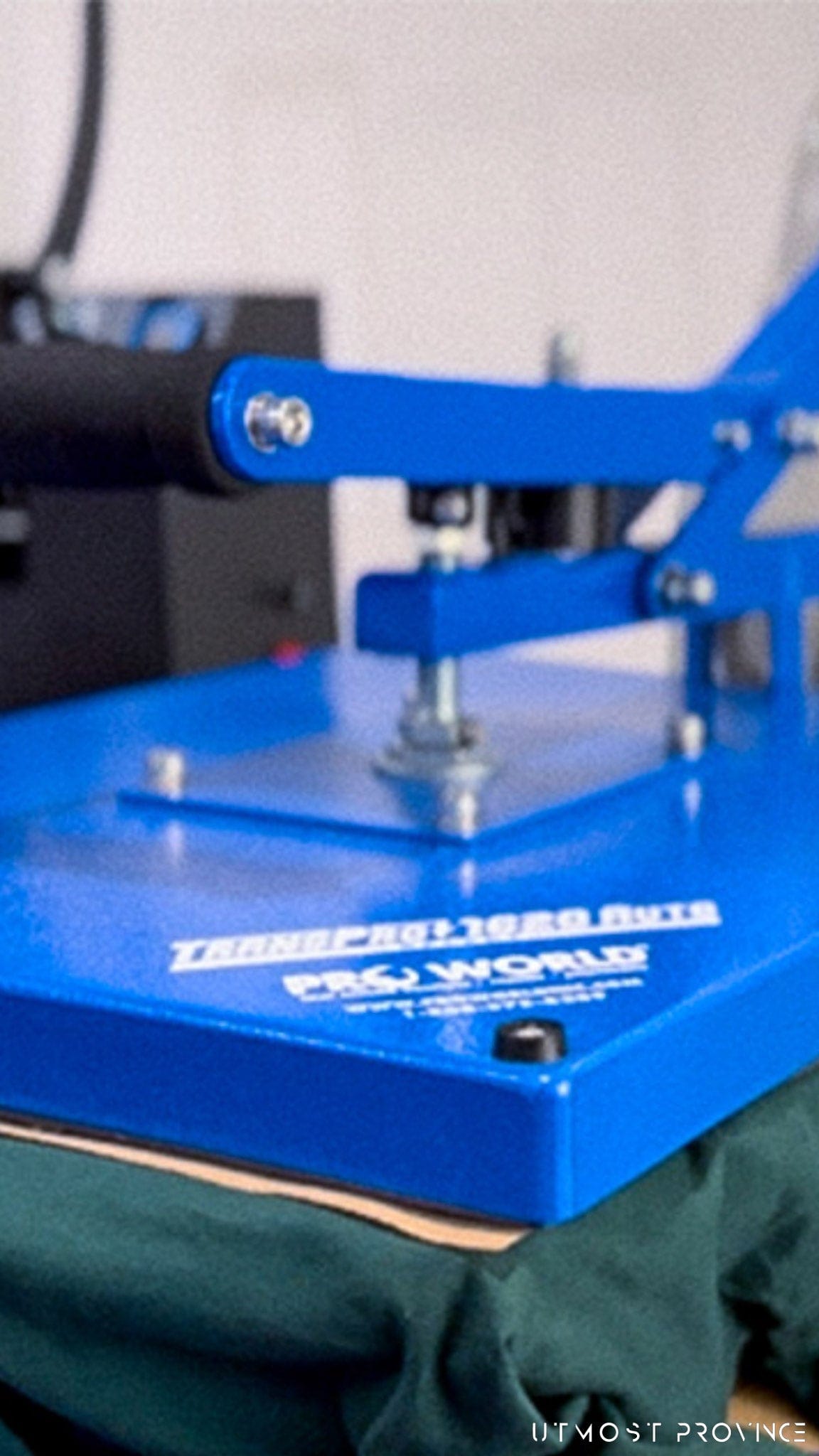 A heat press being used to make a custom t-shirt