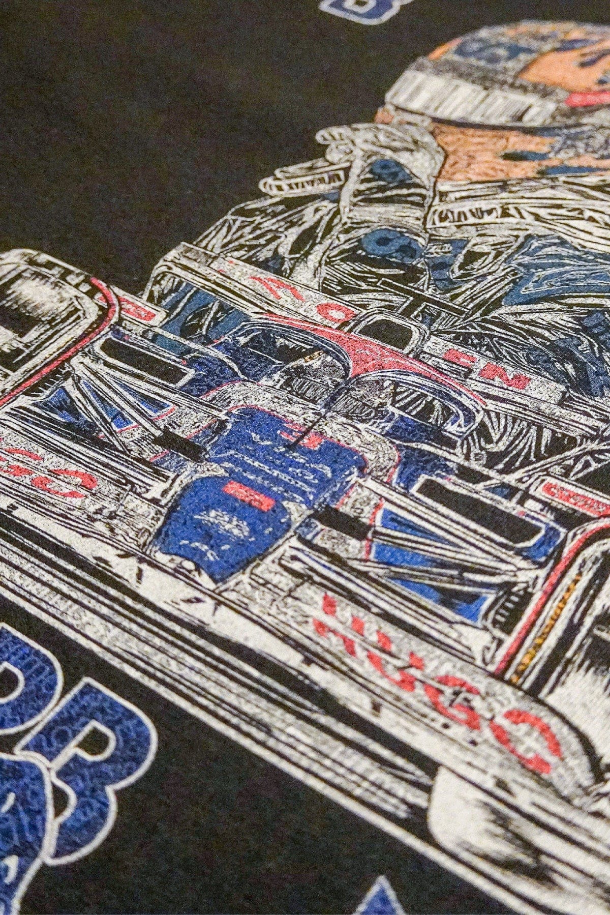 Close up of the back of a black Ricciardo F1 shirt designed by Utmost Province.