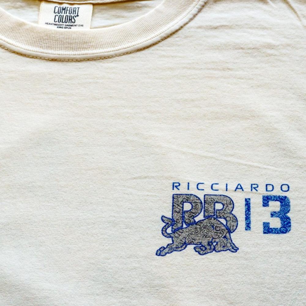 Front of Utmost Province's Daniel Ricciardo t-shirt, highlighting the front left chest design,