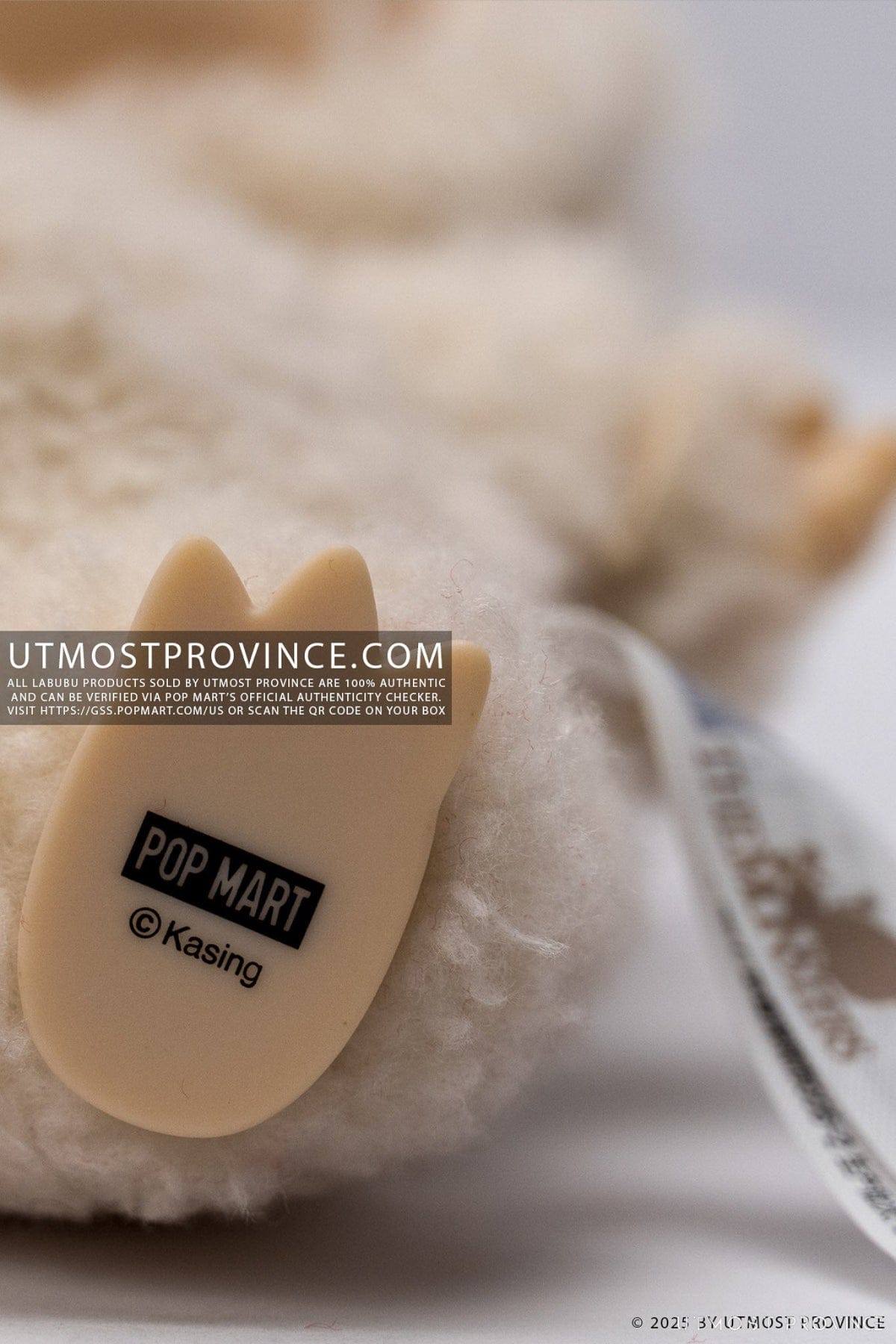 Close up of the bottom of a Exciting Macaron Labubu doll,  showcasing the quality of an authentic Pop Mart Labubu doll.