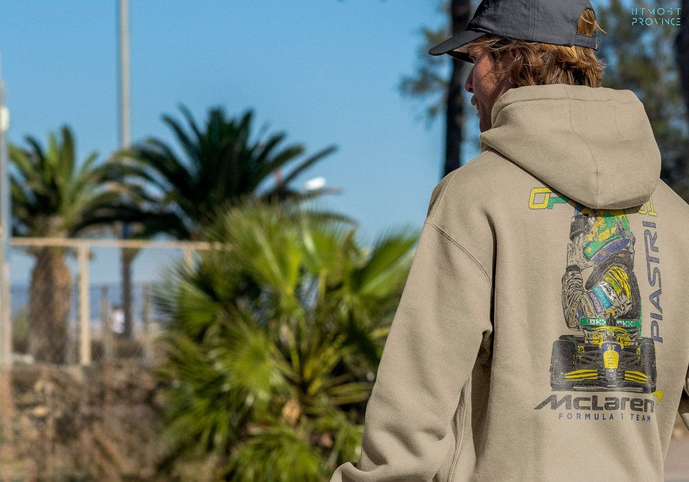Model wearing a beige Mclaren F1 hoodie.