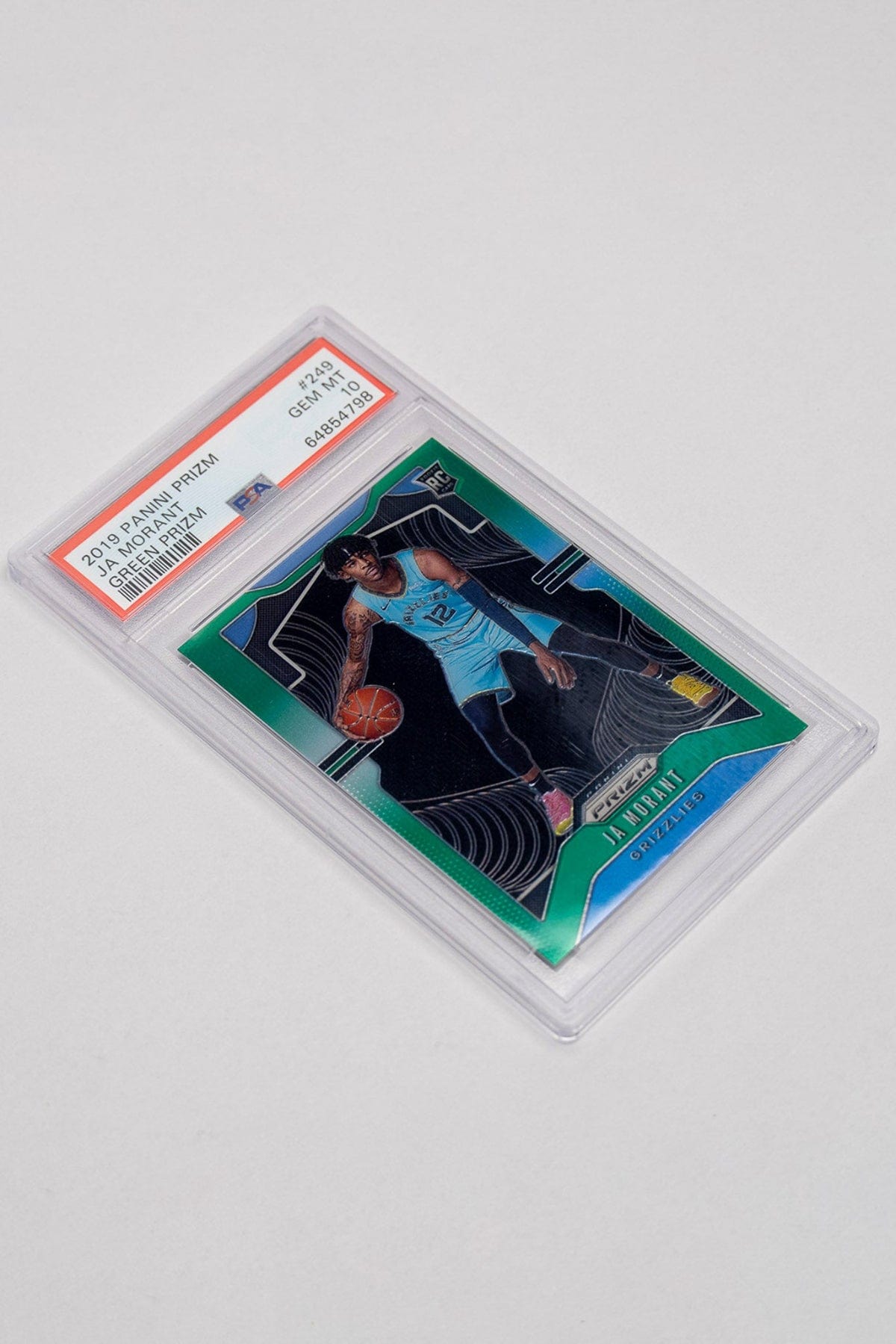 Ja Morant rookie card on a white table.