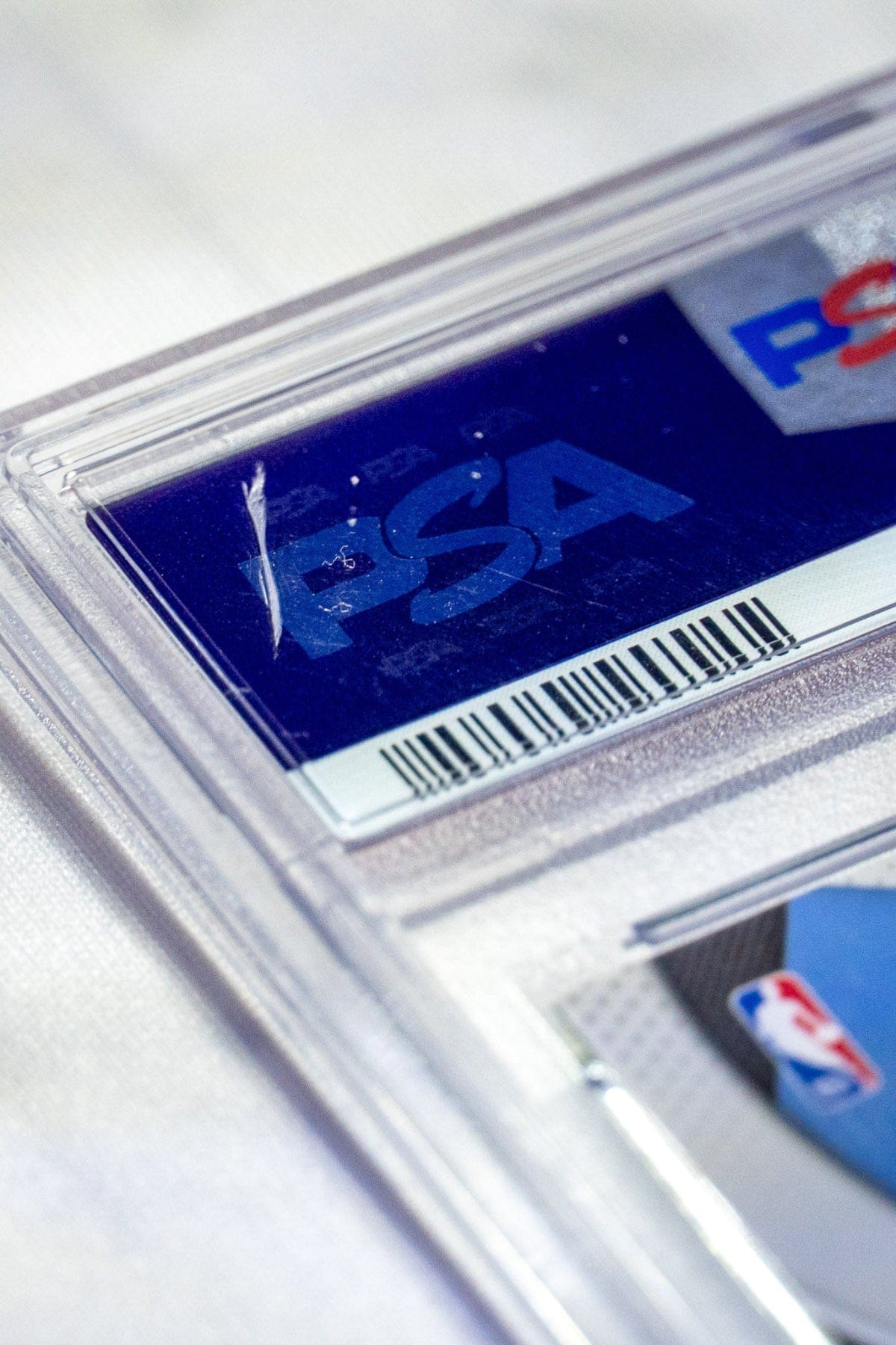 Back of the PSA 10 Prizm Basketball card showing the hairline crack on the back.