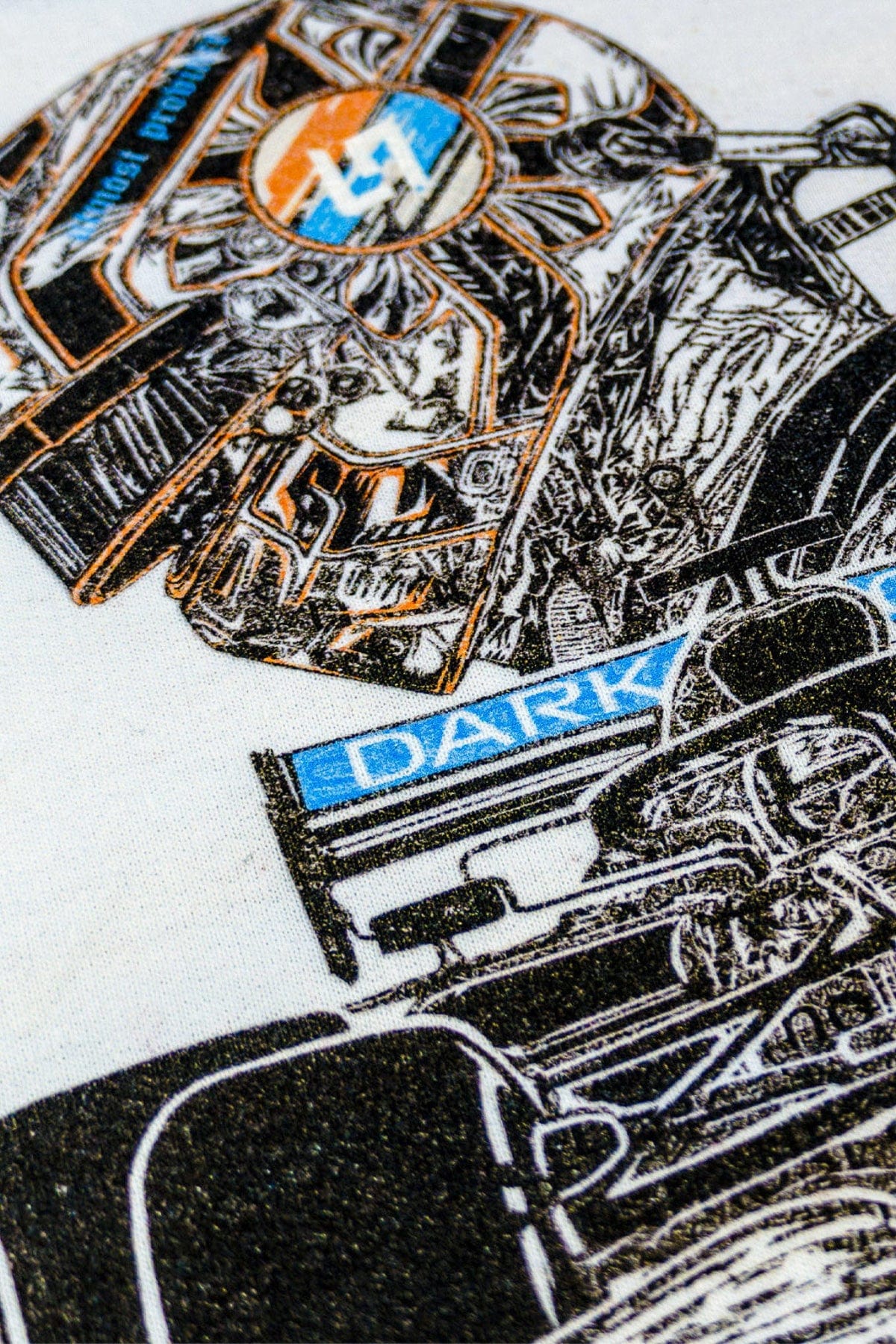 Close up of the details of Utmost Province custom F1 Mclaren T shirt.
