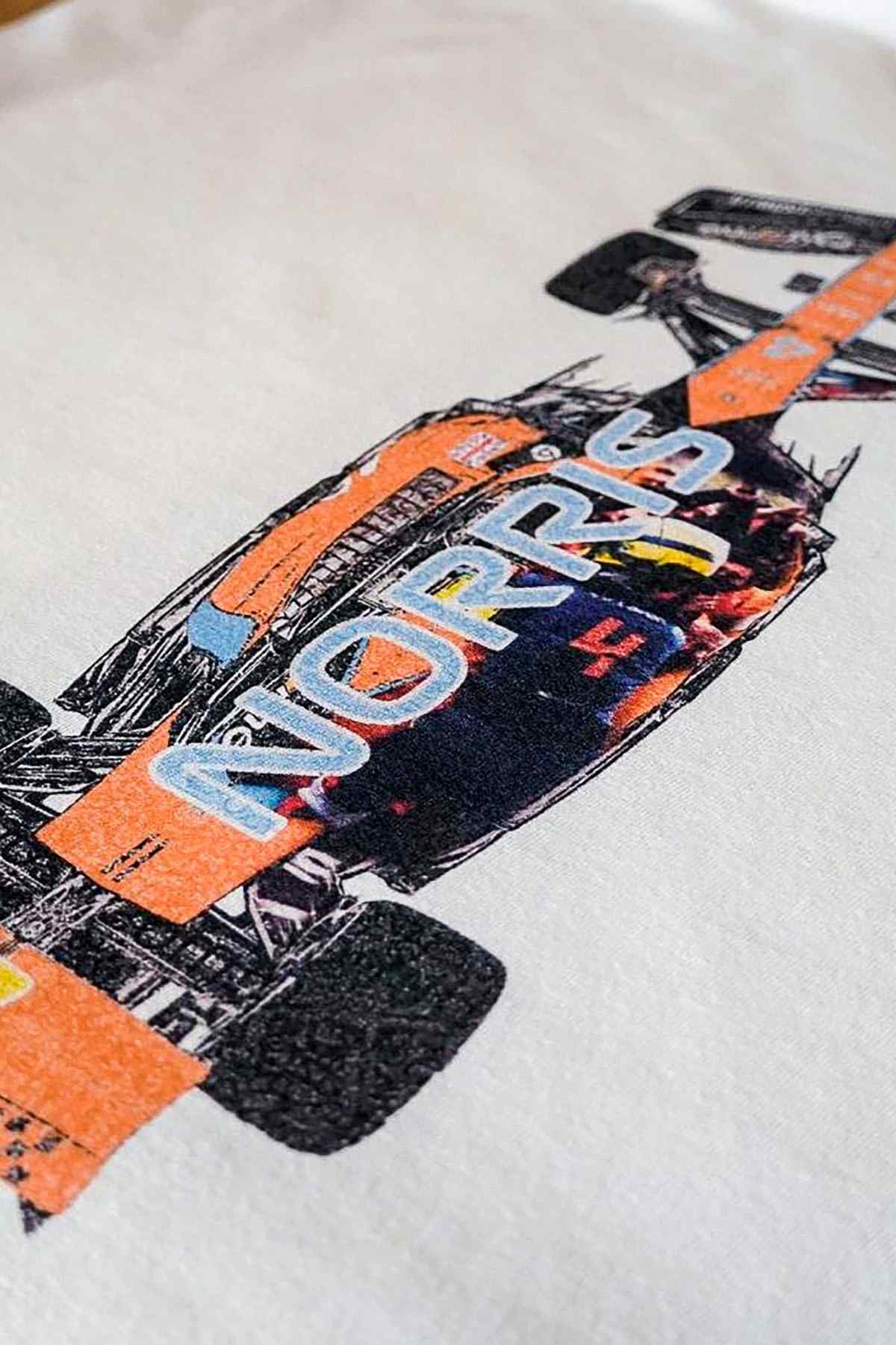 Utmost Province Lando Norris inspired t shirt, highlighting the graphic design on the back of the unisex F1 shirt.