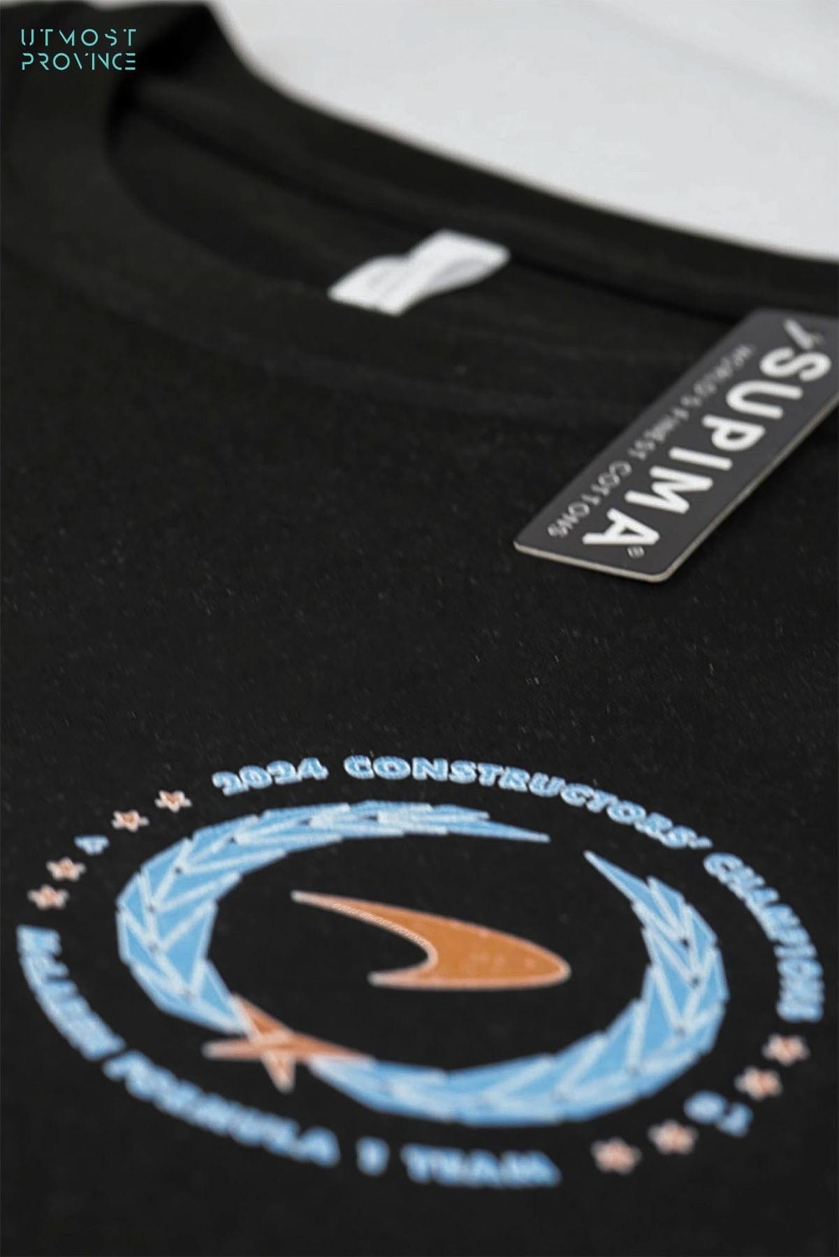 Utmost Province Lando Norris shirt laid flat on a table, highlighting the exclusive custom design on the front of the Mclaren F1 merch.