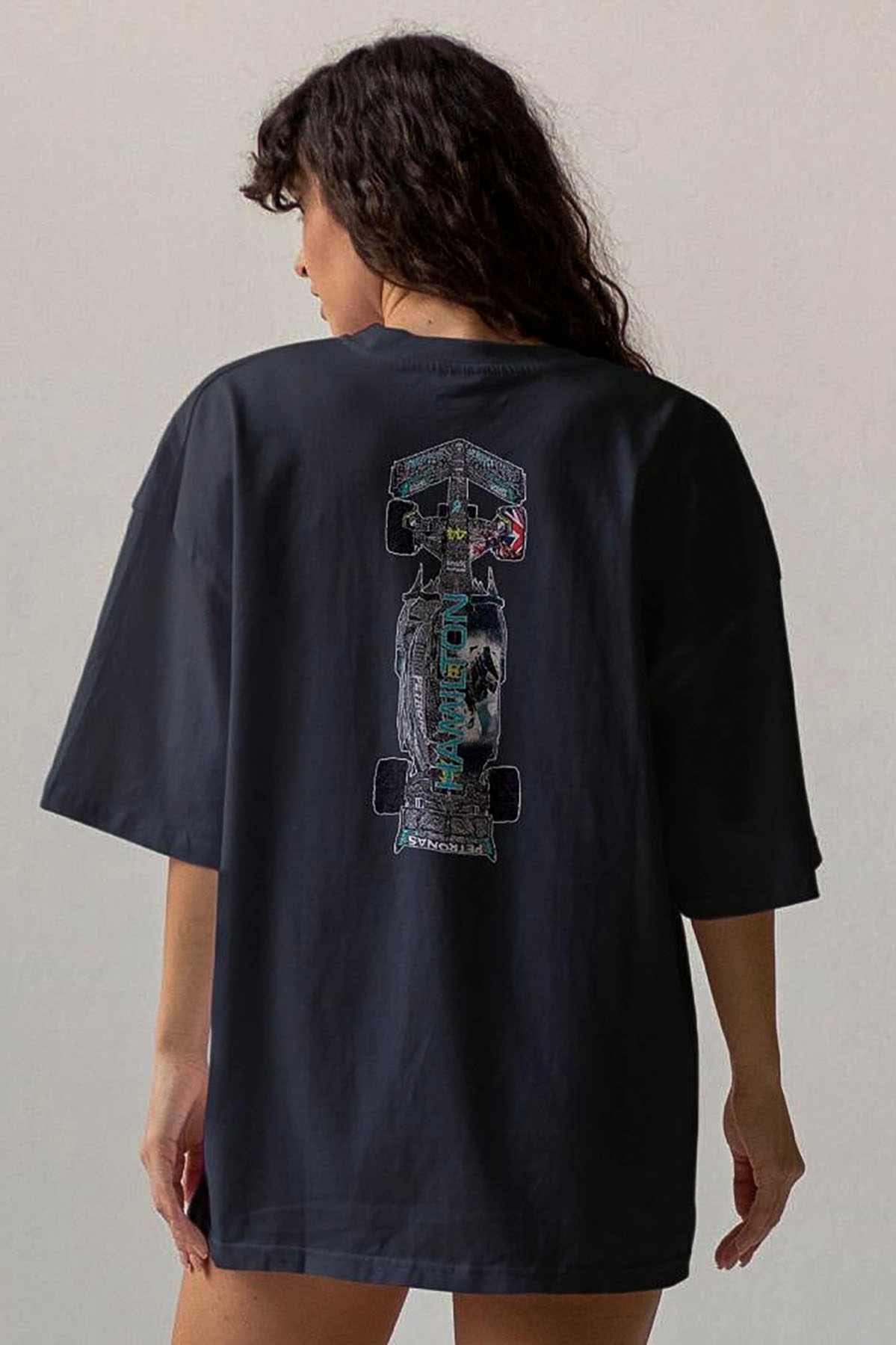 Model wearing Utmost Province Lewis Hamilton Mercedes F1 t-shirt, showcasing the graphic design on the back of the F1 shirt.