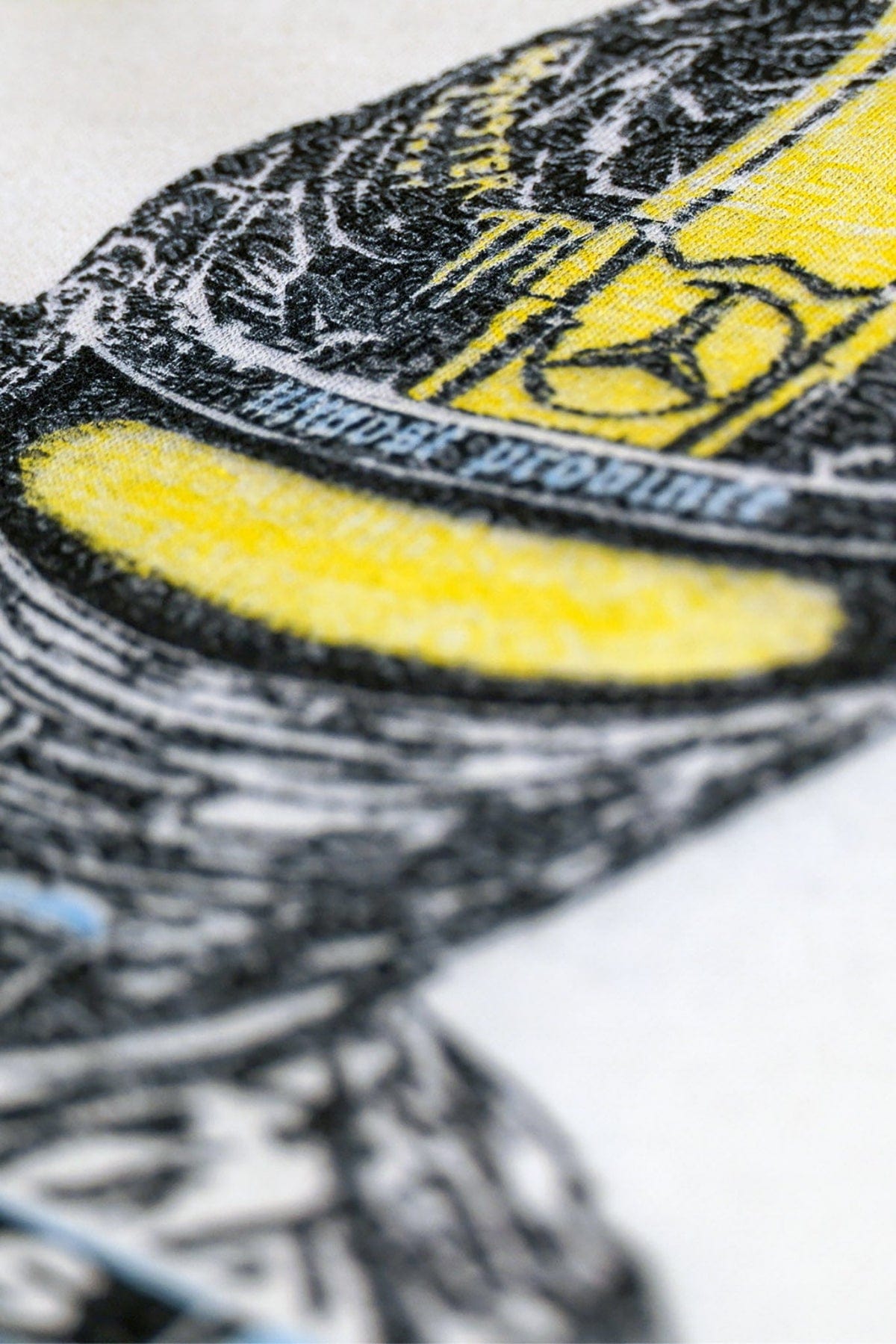Close up of the details of Utmost Province's custom Mercedes shirt.