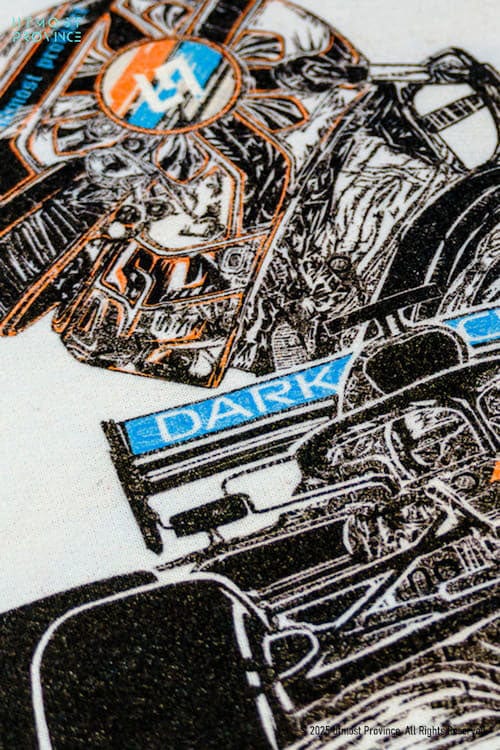 Custom F1 shirt laid flat on a table, highlighting the details of the design from Utmost Province's Lando Norris inspired merch collection.