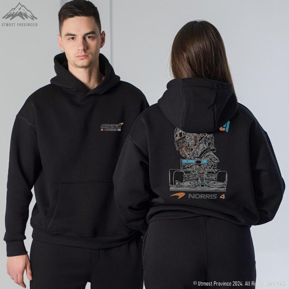 Custom F1 racing hoodie inspired by Lando Norris. Utmost Province 100% organic cotton hoodie is presented by two Formula 1 fans, showcasing the unique designs on the Mclaren F1-inspired hoodies.