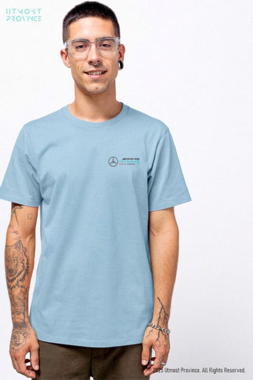 Model showcasing a F1 shirt from Utmost Province's Mercedes F1 merch collection.