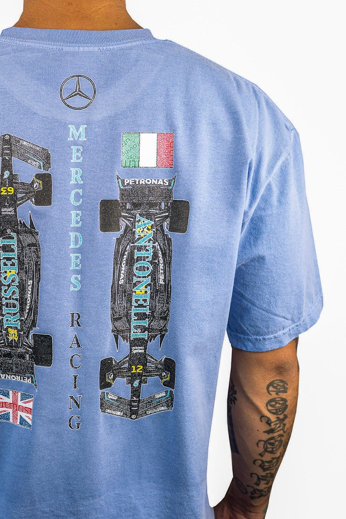 Person wearing a custom Mercedes F1 shirt inspired by George Russell & Kimi Antonelli.