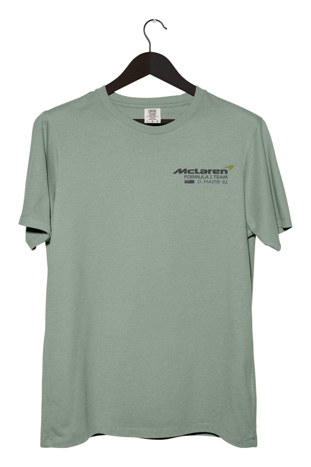 Front of a Comfort Colors bay colored t-shirt, with a custom Mclaren F1 logo on the front.