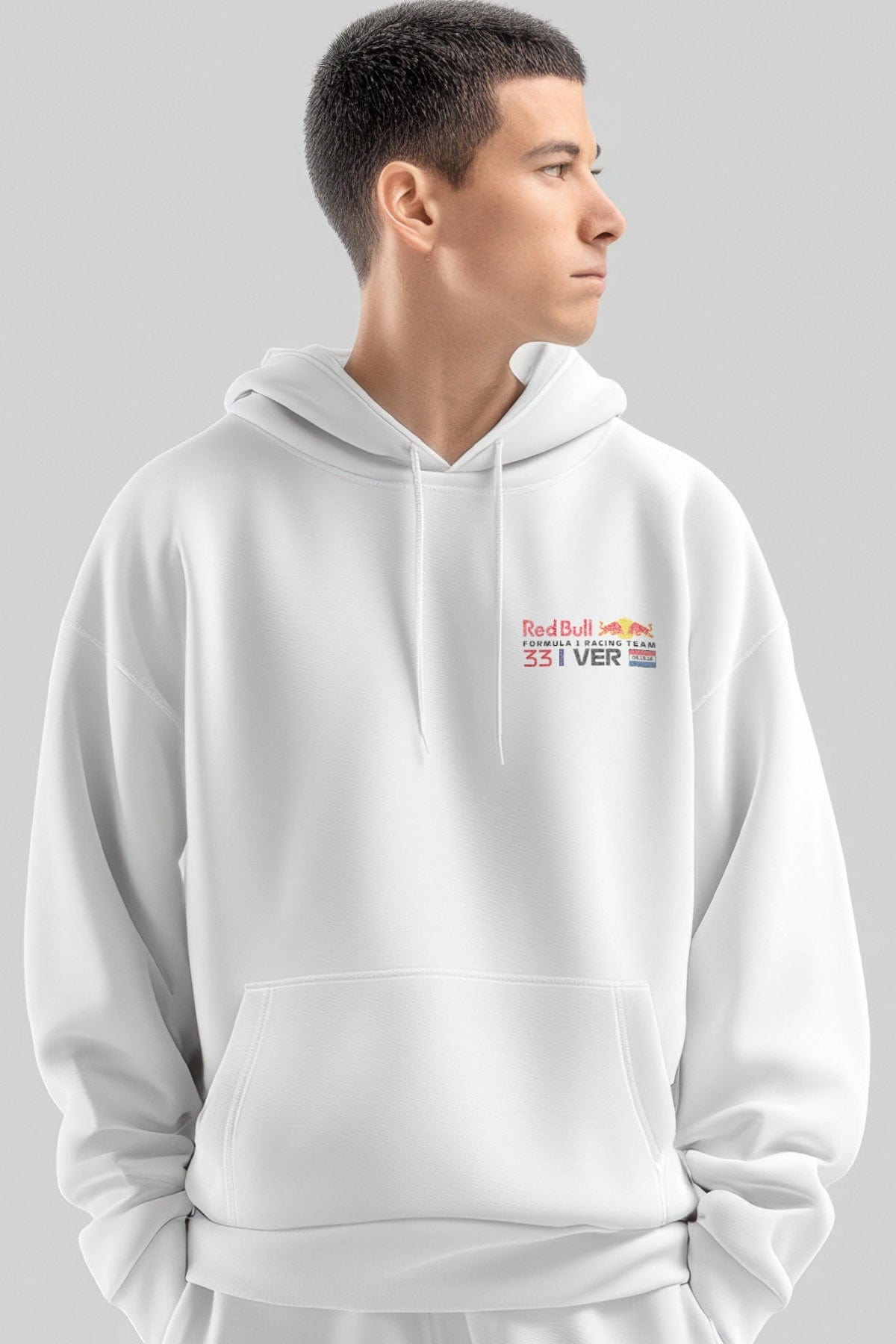 Person wearing a white Gildan fleece hoodie, showcasing the front graphic design on the Red Bull Racing Hoodie.