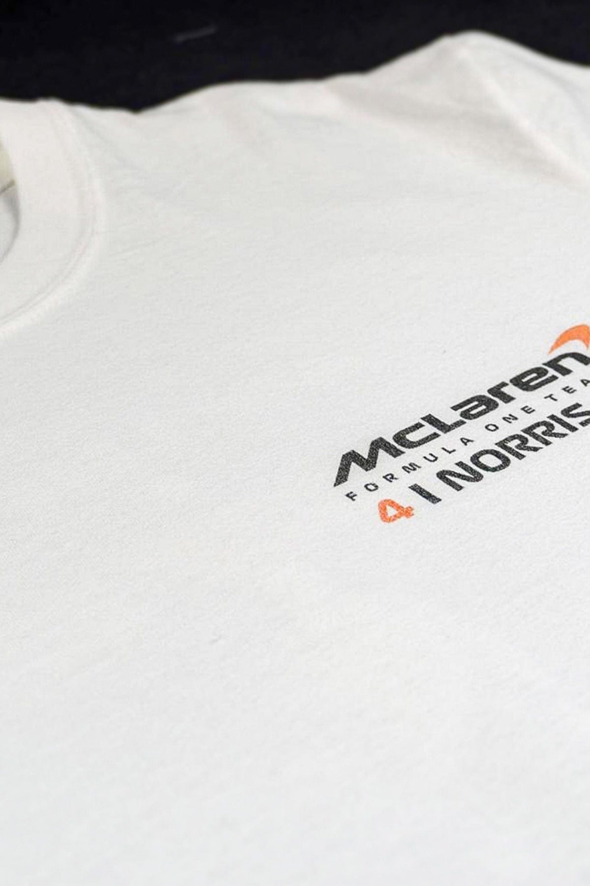 Close up of the front of Utmost Province custom Lando Norris shirt.