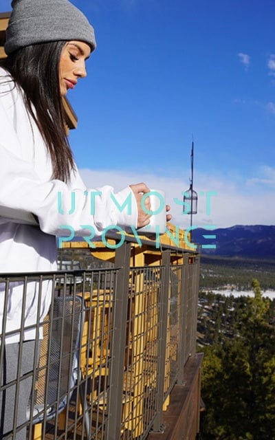 Model wearing a fleece hoodie, handmade by Utmost Province. Cover photo for Utmost Province Brand Story.